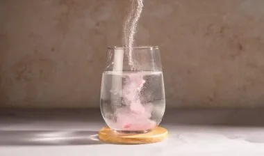 adding mix to glass of water